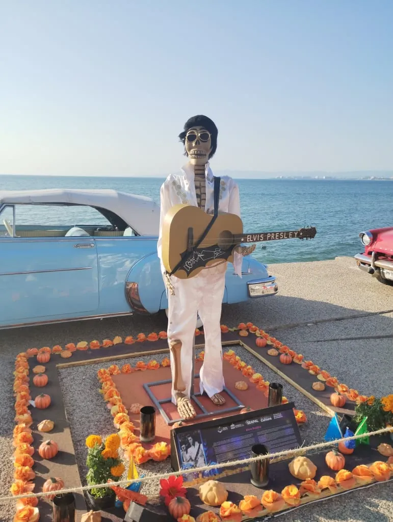 Elvis skeleton statue with guitar on Puerto Vallarta boardwalk