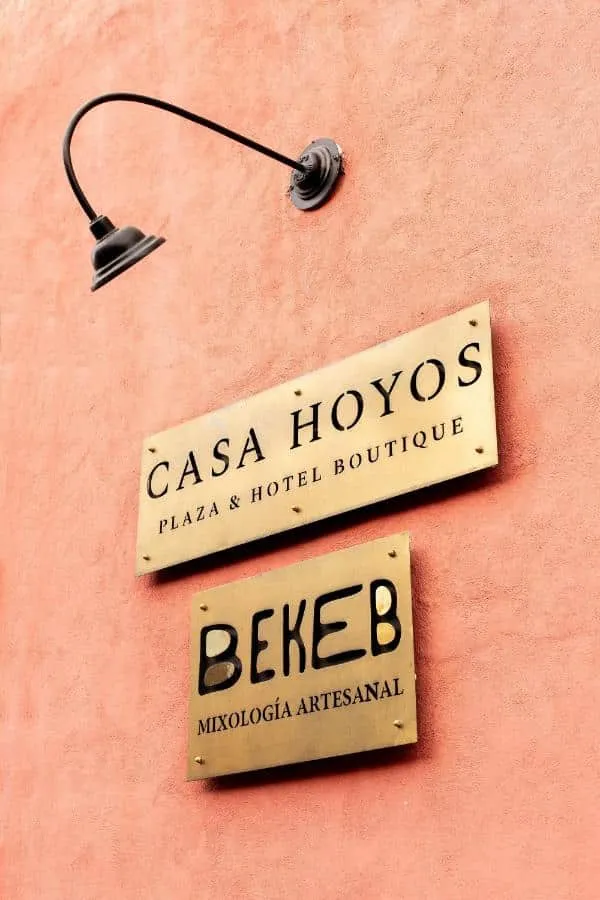 Bekeb terrace at Casa Hoyos with tall walls and lounge seating