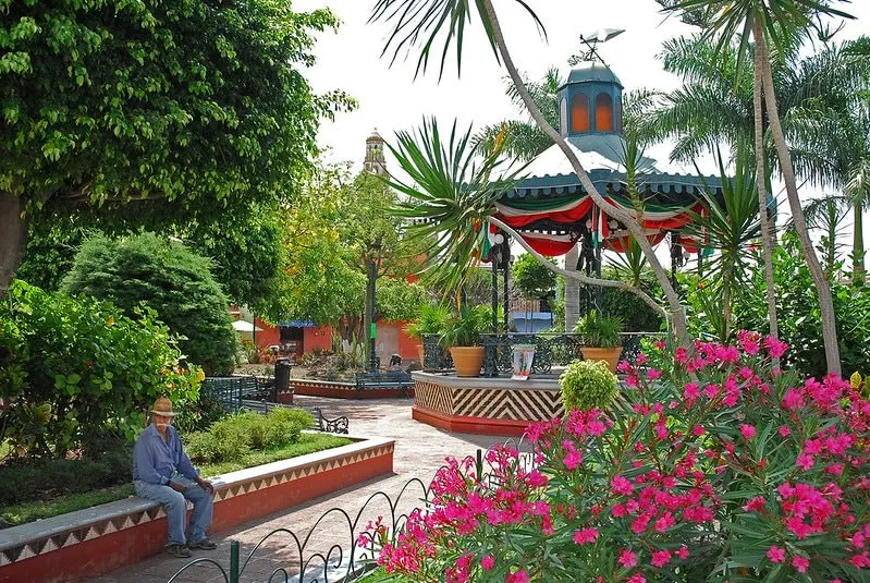 Ajijic Mexico main plaza kiosk surrounded by colonial architecture and garden