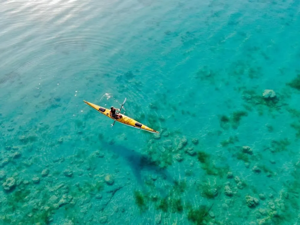 Kayaks on the calm turquoise Bacalar Lagoon