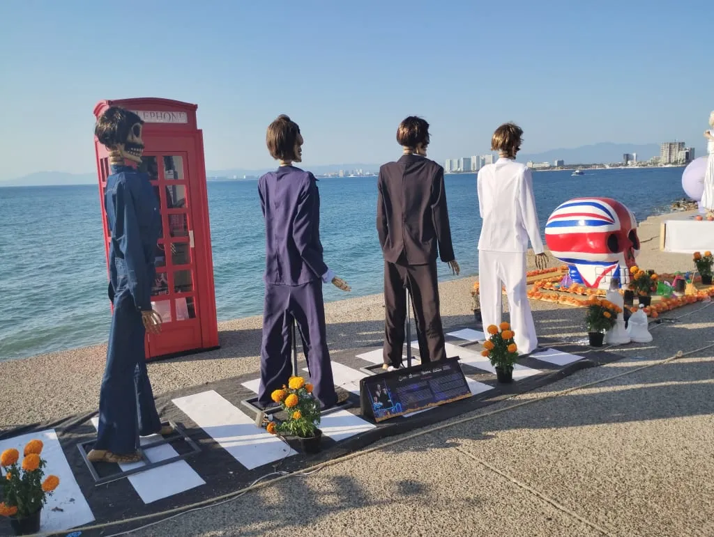 Beatles-themed skeleton installation on Puerto Vallarta boardwalk
