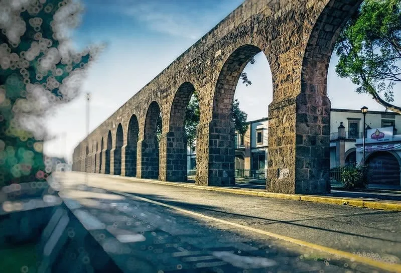 Morelia aqueduct arches and colonial street scene