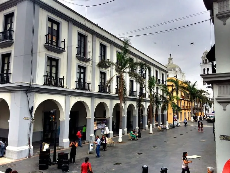 Historic Veracruz plaza with colonial buildings and palm trees