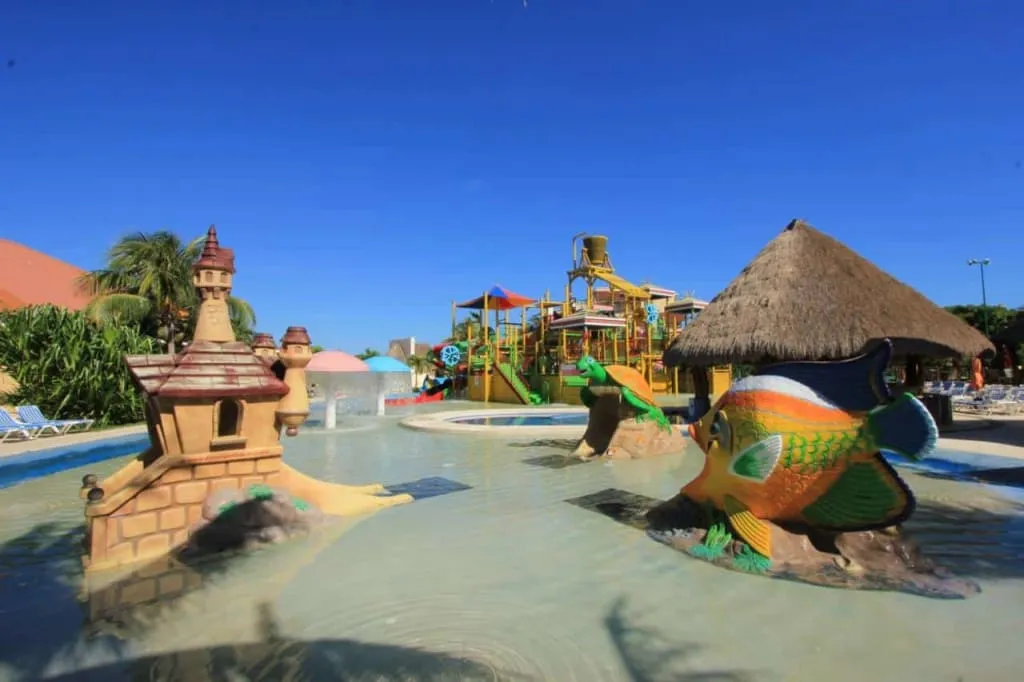 All Ritmo Cancun resort pool and water park area set up for families with kids