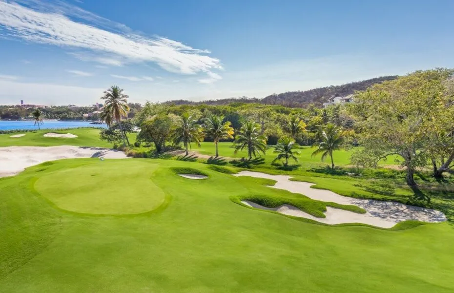 Las Parotas golf course in Huatulco framed by jungle and Tangolunda Bay
