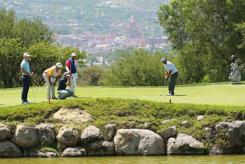 San Miguel de Allende golf green with the parish towers visible beyond the fairway