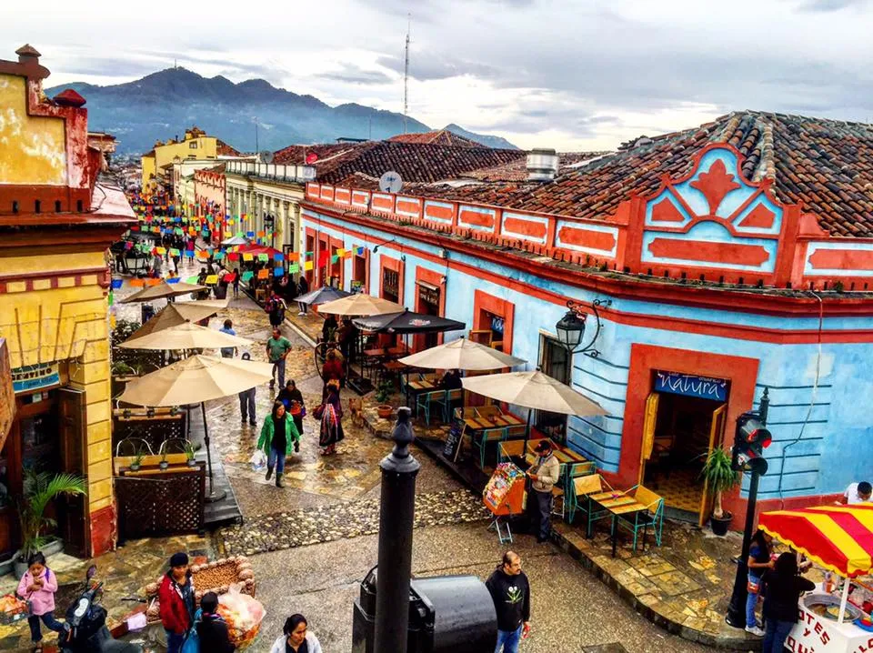 San Cristobal de las Casas church steps and mountain-town skyline