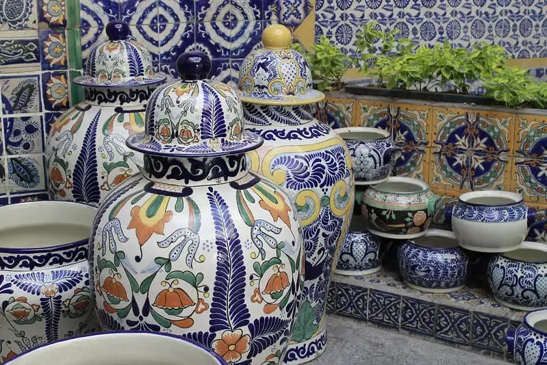 Hand-painted Talavera pottery plates and bowls from Puebla