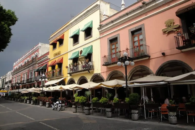 Colorful Puebla buildings and church domes near the main square