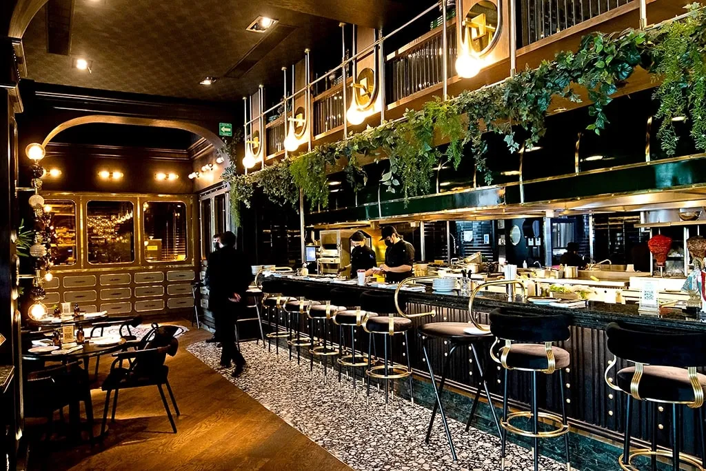 Colmillo steakhouse table with grilled cuts and tacos in Guadalajara