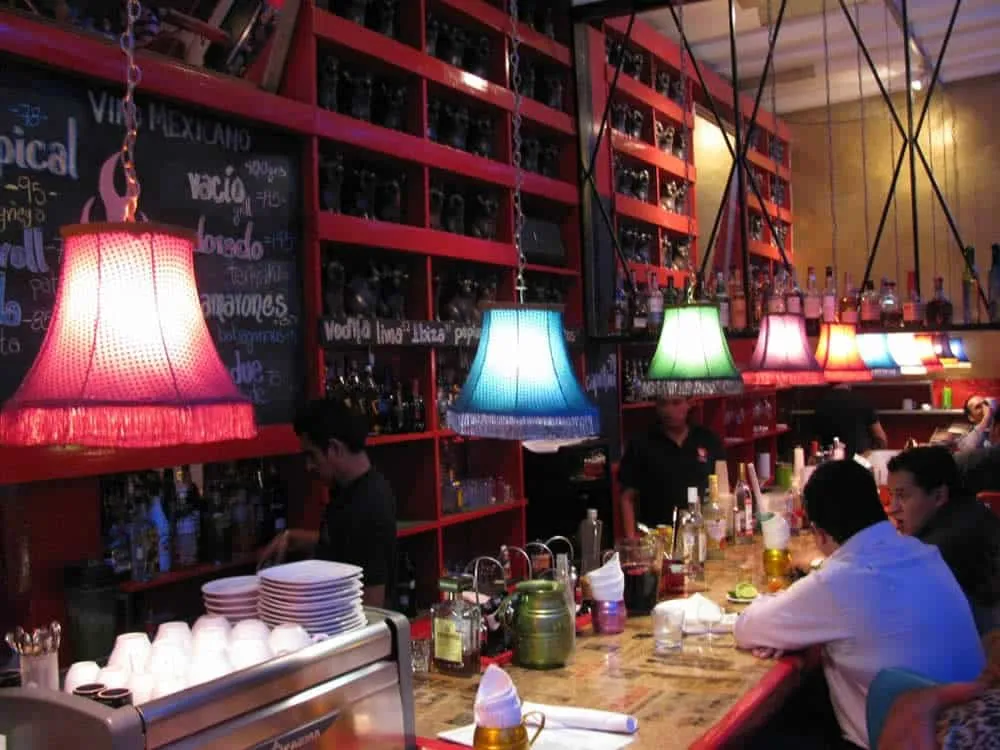 i Latina dining room with colorful modern Mexican dishes