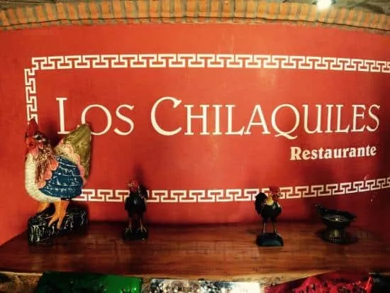 Los Chilaquiles breakfast plate with salsa and toppings in Guadalajara