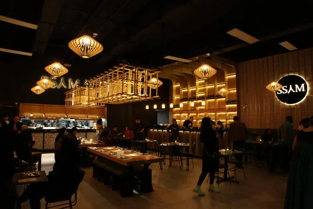 SSAM Korean restaurant table with fried chicken and ramen in Guadalajara