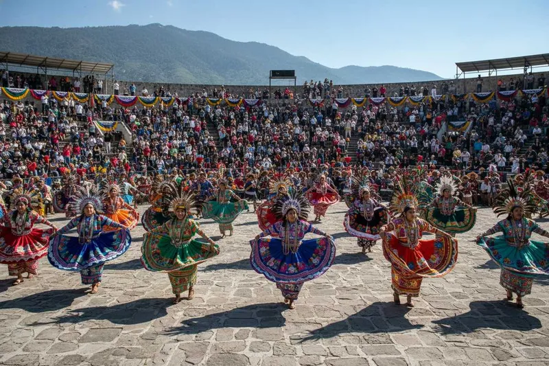 Oaxacan dancers in traditional clothing representing festival demand outside the calmer February travel window