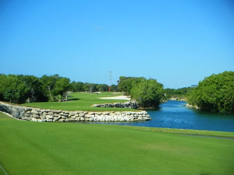 El Camaleon at Mayakoba fairway passing through mangroves near Playa del Carmen