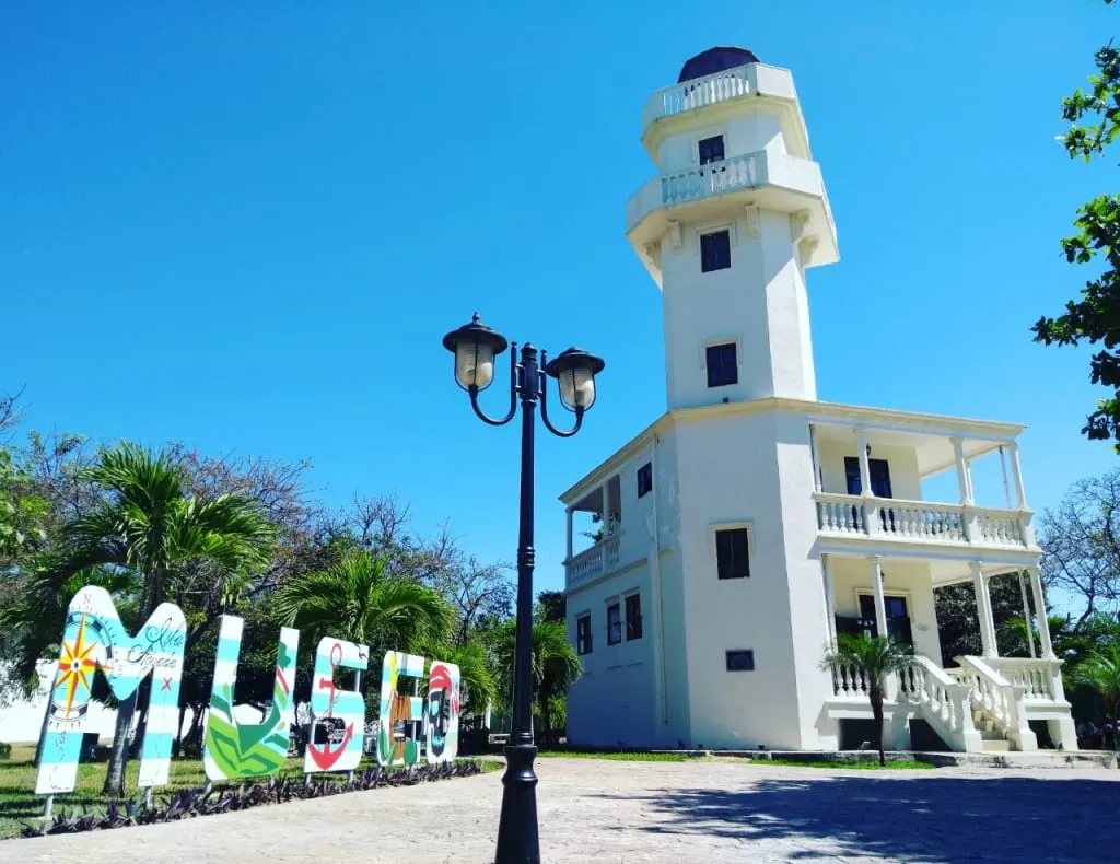 Restored Isla Aguada lighthouse and museum beside the coast