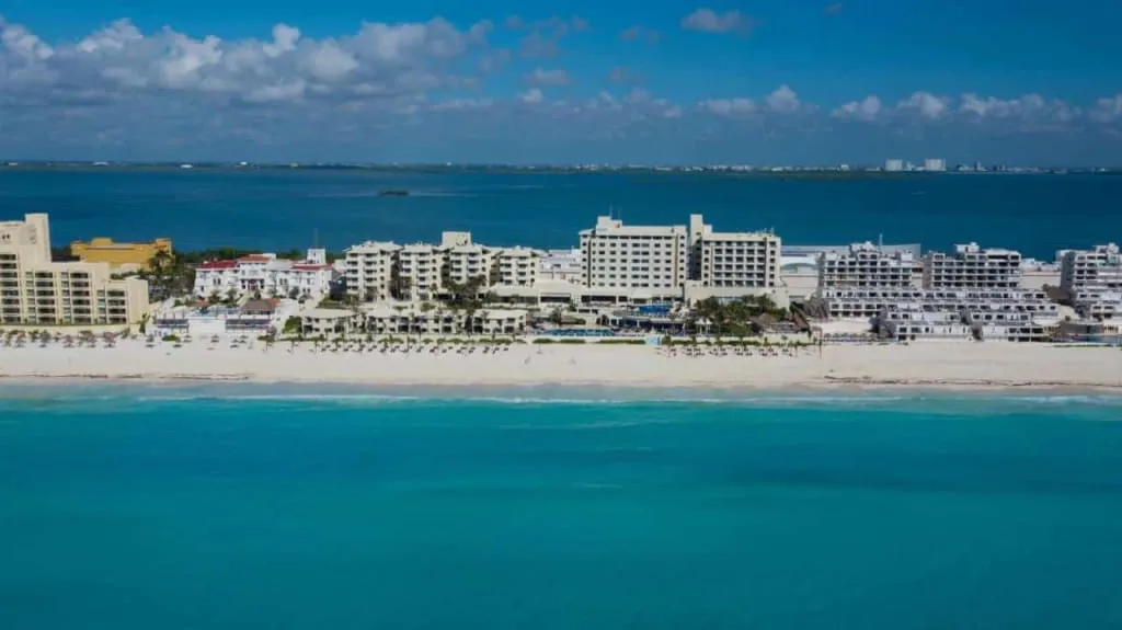 Occidental Tucancun beachfront resort beside turquoise Hotel Zone water