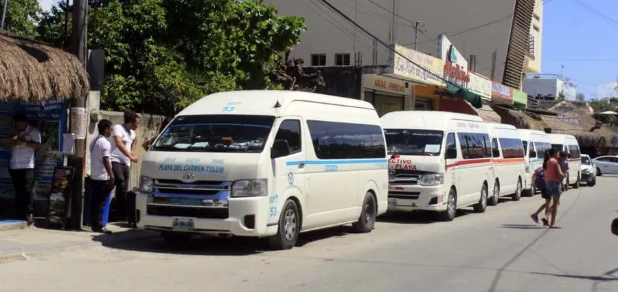 White colectivo van stopping beside the highway between Playa del Carmen and Tulum