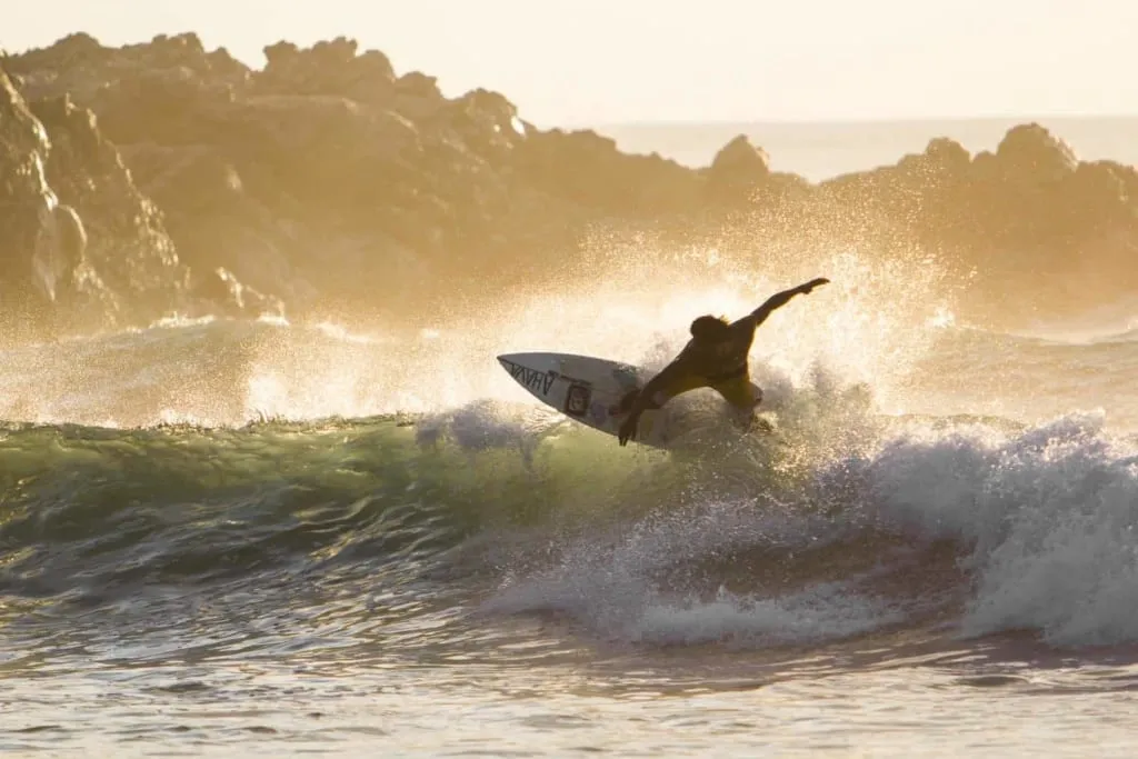 Surfers waiting for mellow waves off Chacahua beach