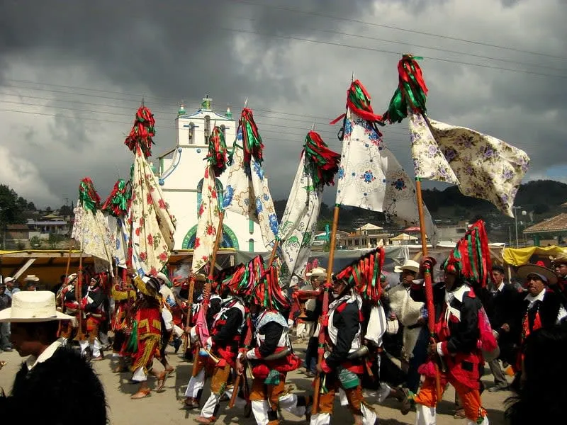 San Juan Chamula Carnival participants in traditional costumes during the annual K'in Tajimoltik celebration, the most important Chamula festival