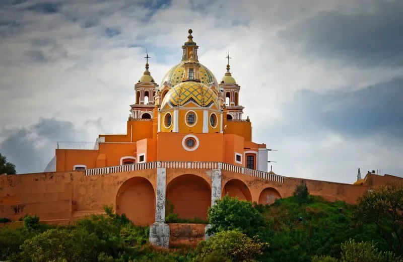 Cholula pyramid and church viewed across the Puebla Valley