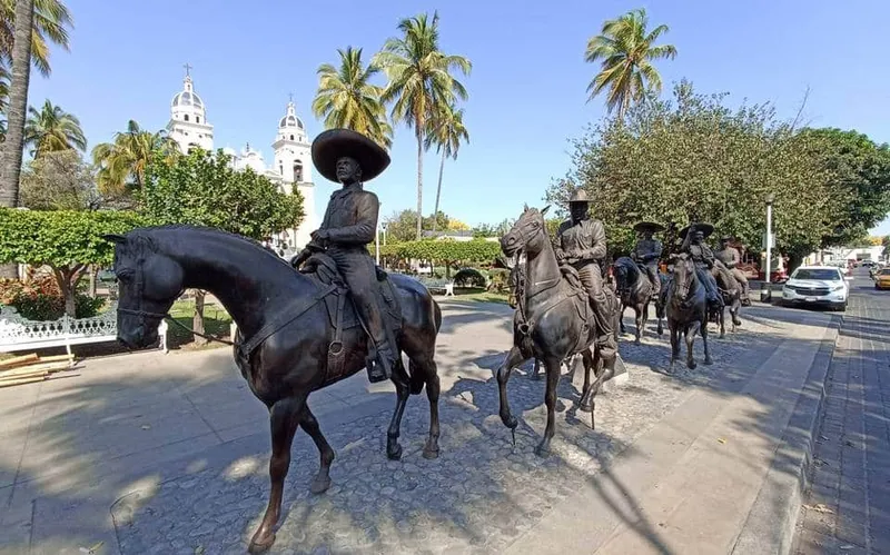 Colima museum and plaza stop used as a shaded break during a humid August afternoon