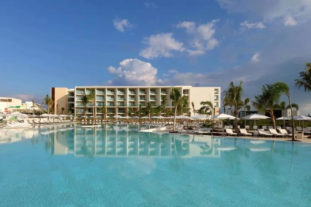 Grand Palladium resort buildings and pools beside the Costa Mujeres beach