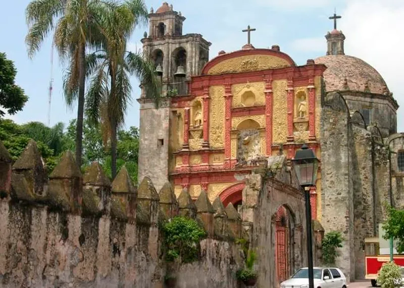 Cuernavaca cathedral facade and plaza trees in the historic center