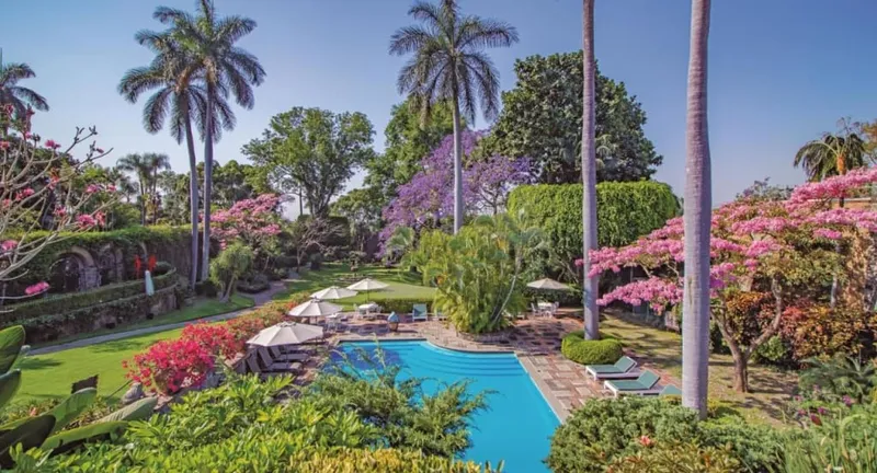 Las Mananitas garden hotel courtyard with poolside greenery in Cuernavaca