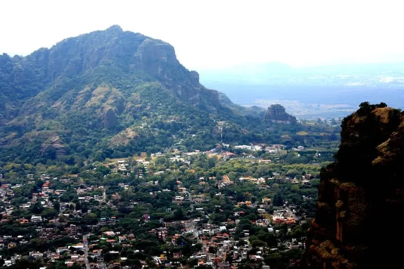 Tepoztlan streets below green cliffs on a side trip from Cuernavaca