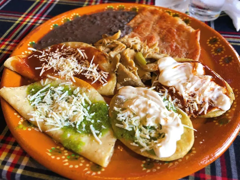 Traditional Cuetzalan market food served with local coffee and yolixpa