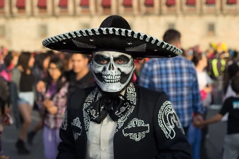 Black charro costume with dark suit hat and skeleton makeup