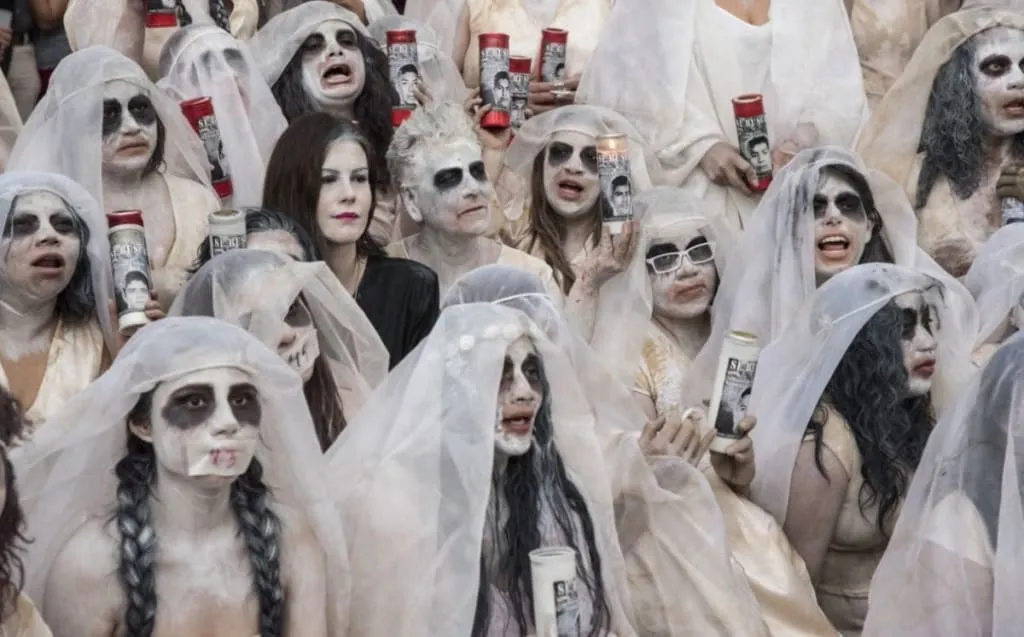 La Llorona costume with white veil and ghostly dress