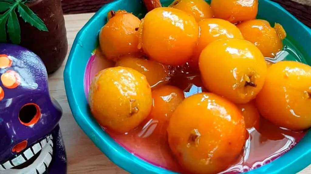 Candied tejocotes in syrup served as a seasonal Mexican sweet