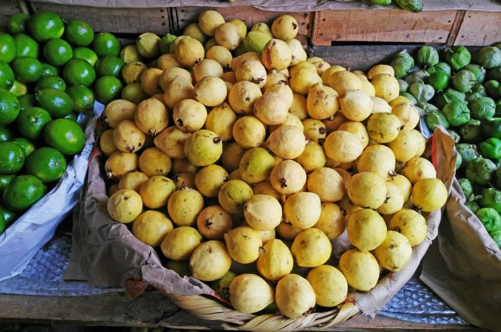 Fresh guavas from Mexico with yellow skin and pink flesh