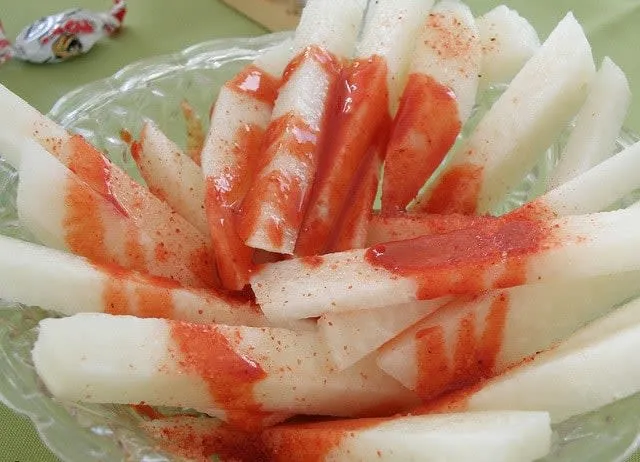 Sliced jicama served with lime and chili in Mexico