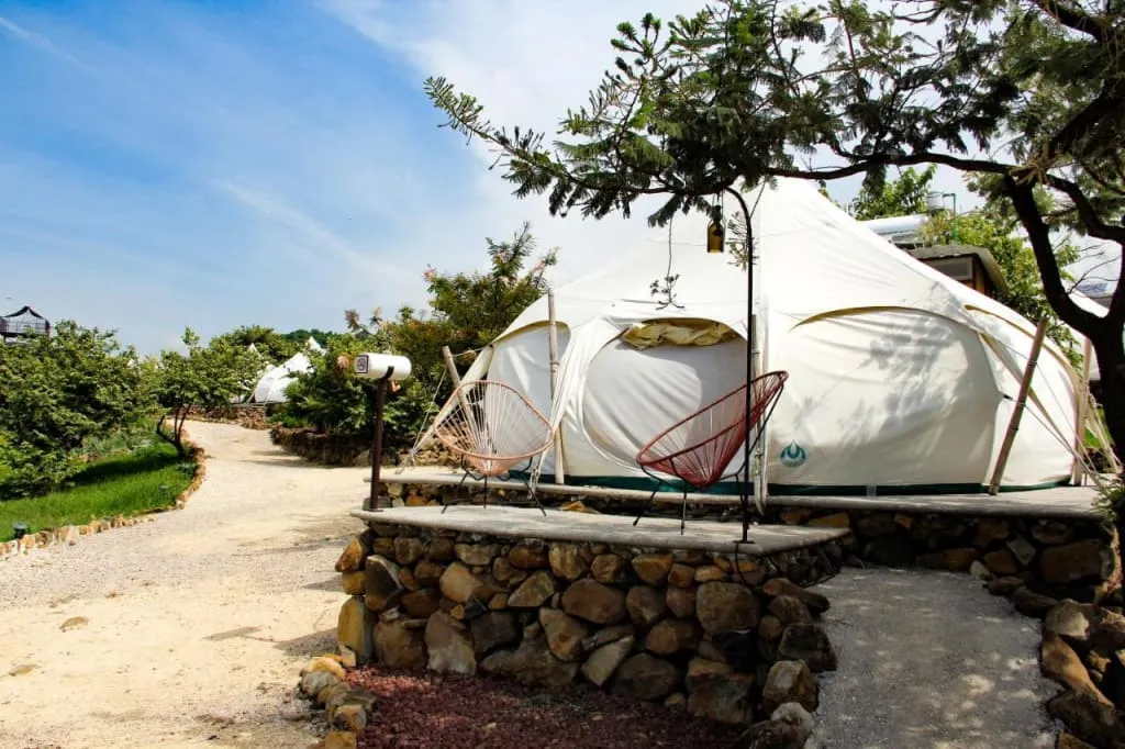Glamping tents in the green hills outside Tepoztlan