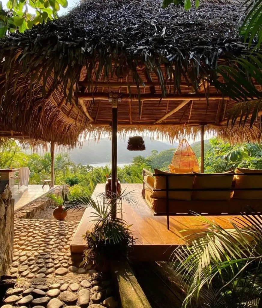 Open-air Verana glamping suite above Yelapa jungle