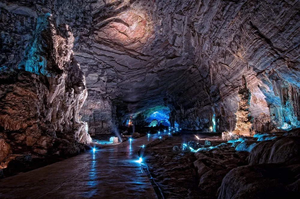 Interior of Grutas de Cacahuamilpa showing massive stalactite and stalagmite formations in one of Mexico's largest cave systems