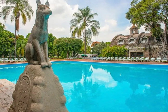 Hacienda Cocoyoc garden courtyard with colonial buildings in Morelos