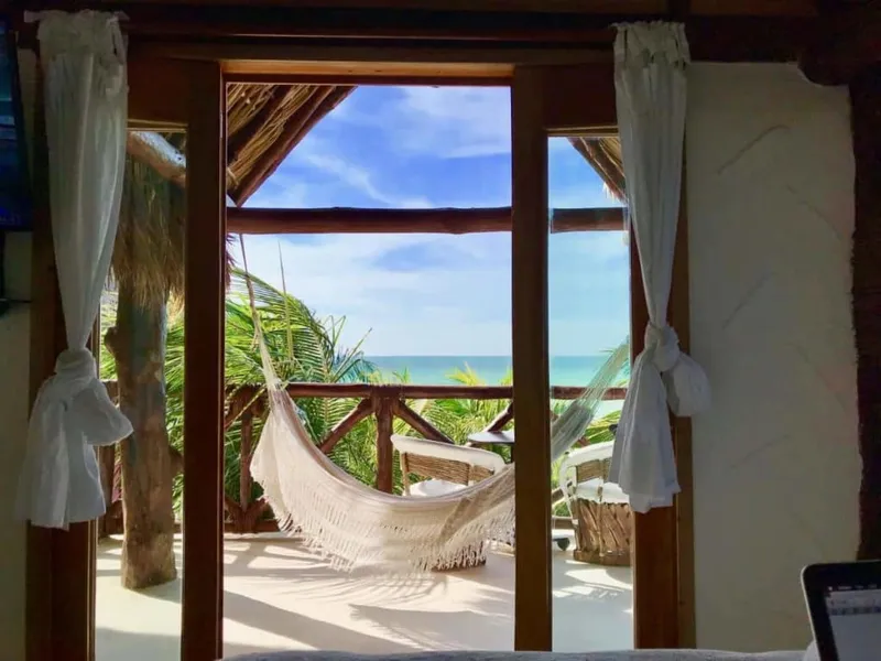Holbox beach hotel setup useful for September heat and rainy-season flexibility