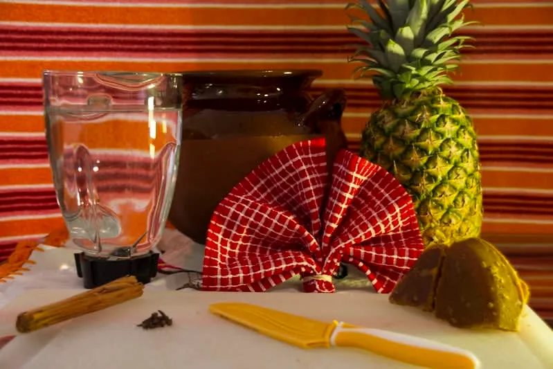 Pineapple peels fermenting with piloncillo and cinnamon for tepache