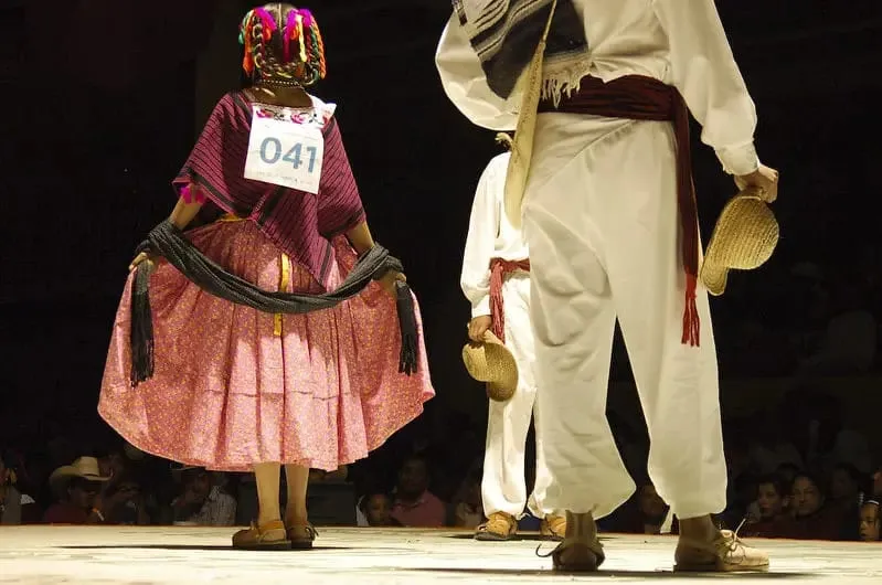 Huastec dancers in embroidered clothing during a regional celebration