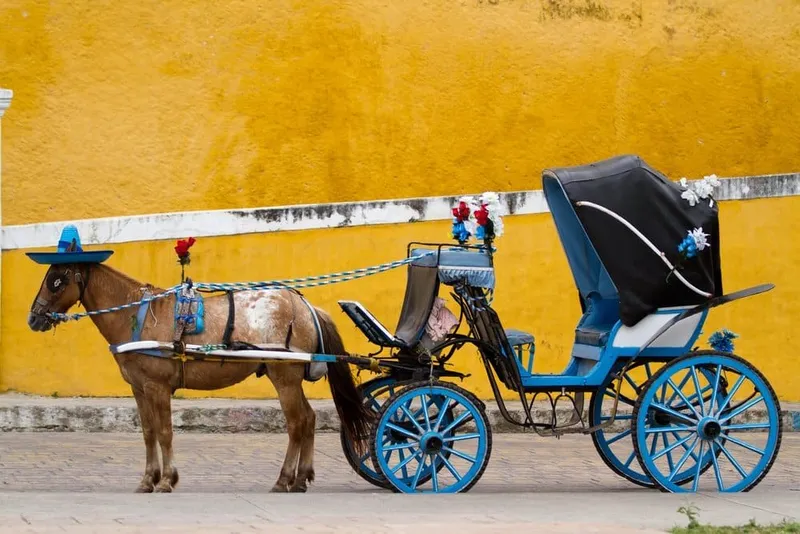 Yellow street in Izamal Yucatan during June heat and rainy season travel