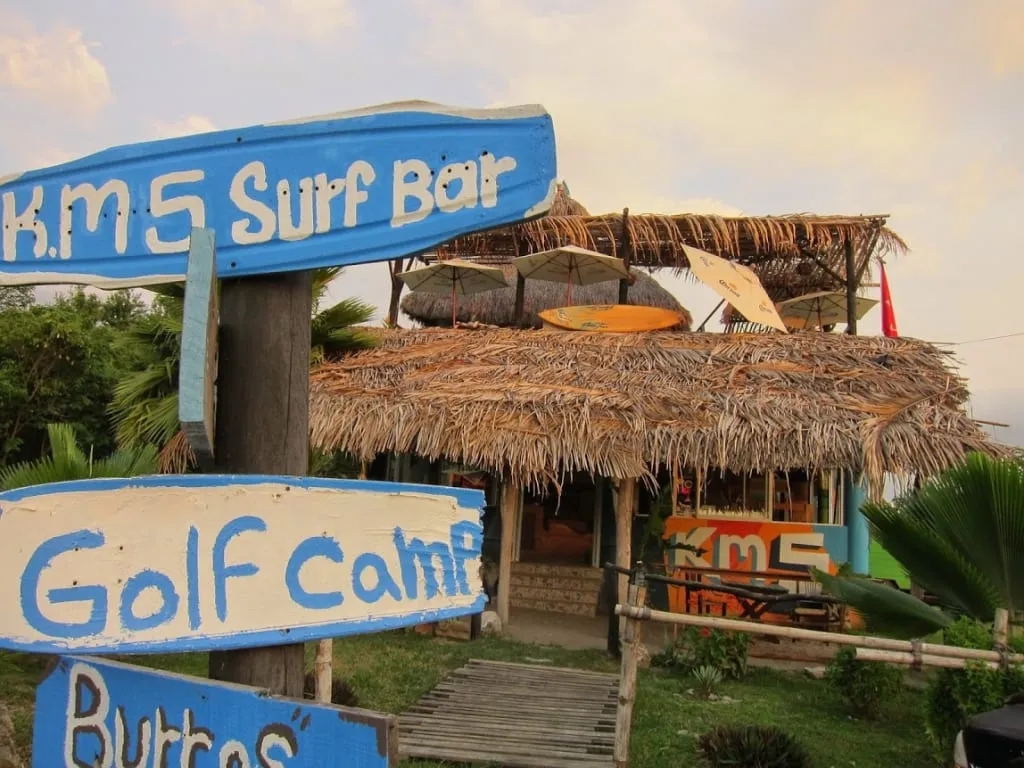 Beginner surfer practicing on gentle waves near Punta Mita