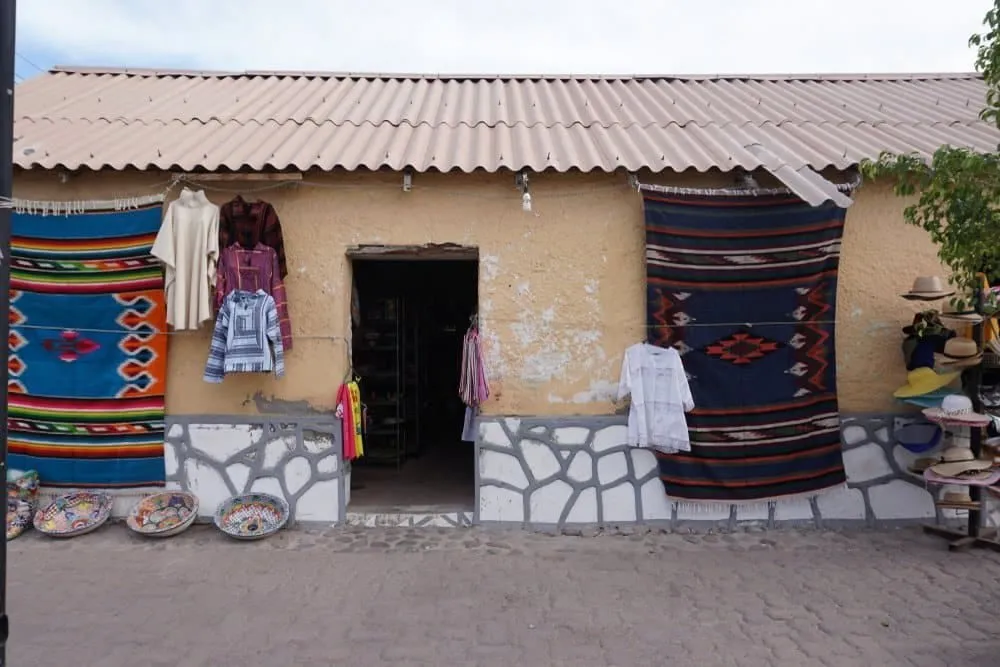 Seashell crafts and handmade souvenirs displayed in a Loreto shop