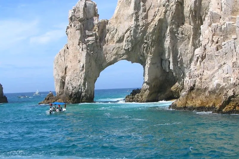 Resort beach and desert coastline in Los Cabos under warm late-season Baja skies