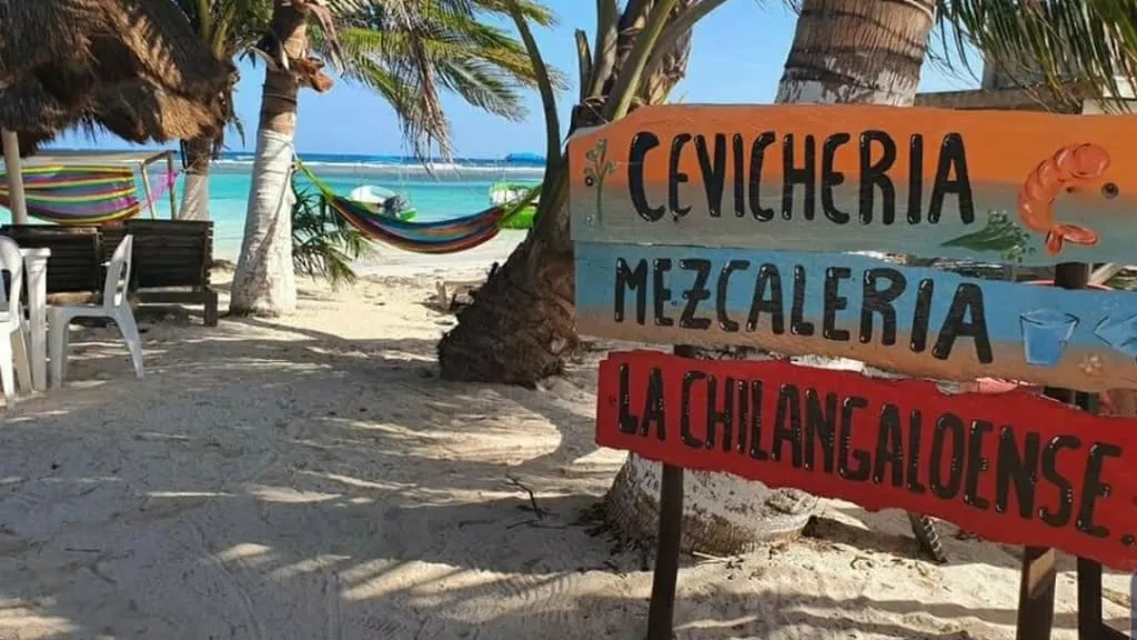 La Chilangaloense beach club tables along Mahahual boardwalk