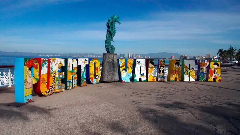 Puerto Vallarta malecon boardwalk — the Zona Romántica to the south is the city's LGBT-friendly district with the most diverse restaurant scene