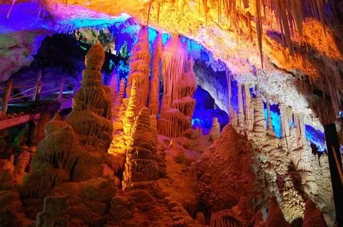 Lit limestone formations inside Grutas del Rosario near Mapimí
